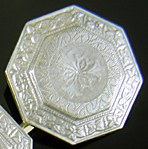 Elegantly engraved platinum and gold cufflinks. (J9333)