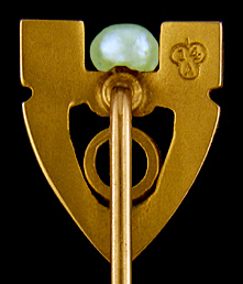 Egyptian Revival stickpin with garnet and pearl. (J9126)