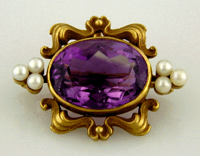 Amethyst and pearl fin de siecle brooch.