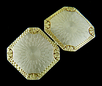 Elegantly engraved platinum and gold cufflinks. (J9231)