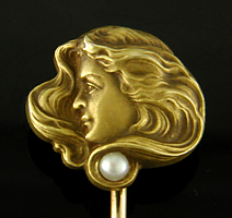 Art Nouveau stickpin of woman with flowing hair. (J9047)