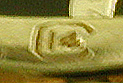 Close up of Carrington maker's mark on reverse of cufflinks. (J9287)