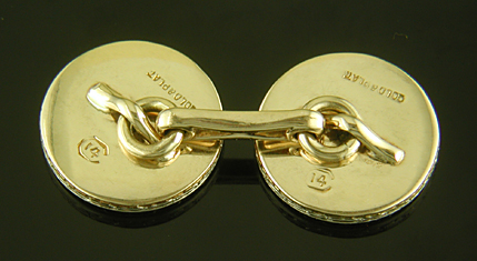 Carrington platinum and mother-of-pearl cufflinks. (J9257)