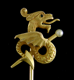 Stickpin with a fiery dragon protecting a golden sceptre. (J9055)