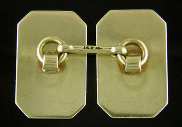 Reverse view of Carter, Gough golden scroll cufflinks. (J8459)