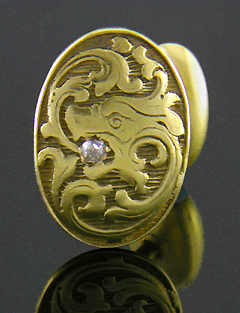 Dragon cufflinks set with small diamonds. (J9048)