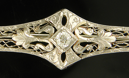 Edwardian brooch set with a sparking Old European Cut diamond. (J3853)