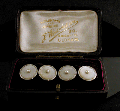 Edwardian platinum and pearl cufflinks in jeweller's box. (J6506)