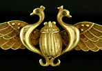 Egyptian Revival winged scarab brooch crafted in 14kt gold. (J3573)