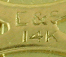 Close-up of Ehrlich & Sinnock maker's mark. (J9502)