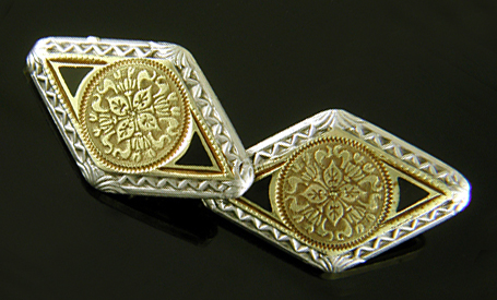 Elegantly engraved gold and platinum cufflinks. (J9283)