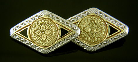 Elegantly engraved gold and platinum cufflinks. (J9283)