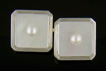 L.E. Garrigus platinum and pearl cufflinks. (J8693)