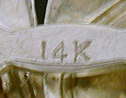 Close-up of gold purity mark. (J9243)