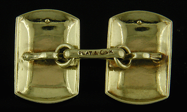 Charles Keller platinum and gold cufflinks with black enamel accents. (J8716)