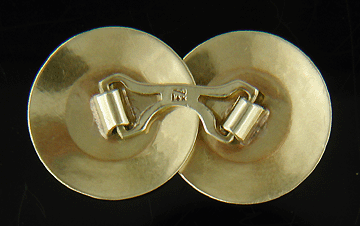 Kohn & Co. yellow and white gold starburst cufflinks. (J8456)