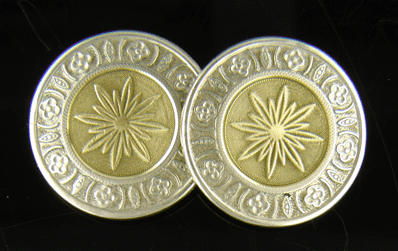 Kohn & Co. yellow and white gold starburst cufflinks. (J8456)