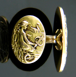 Krementz mermaid and swan cufflinks crafted in 14kt gold. (J8846)