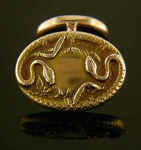 Krementz serpent cufflinks crafted in 14kt gold. (J8832)