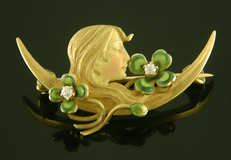 Krementz Art Nouveau brooch of dreaming woman and clover. (J9090)