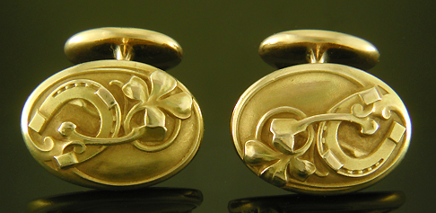 Larter Art Nouveau lucky cufflinks crafted in 14kt gold. (9190)