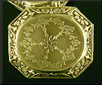 Elegantly engraved 14kt gold cufflinks. (J8813)