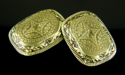 Elegantly engraved gold cufflinks. (J9450)