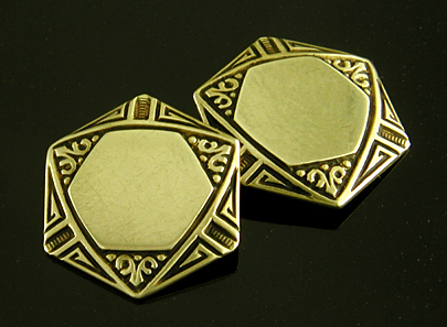 Hexagonal gold cufflinks with black enamel tracery. (J9282)