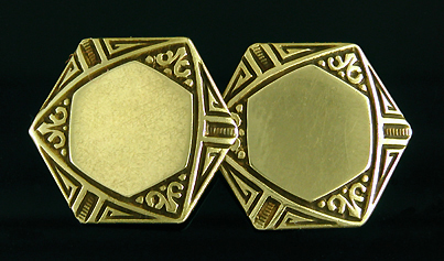 Hexagonal gold cufflinks with black enamel tracery. (J9282)