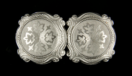 Elegantly engraved antique cufflinks crafted in platinum and gold. (J7203)