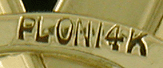 Close-up of precious metal and maker marks. (J8697)