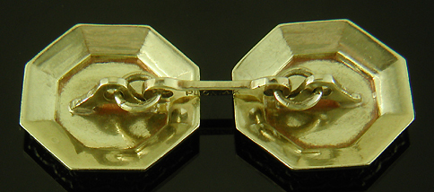 Elegantly engraved platinum and gold cufflinks. (J9333)