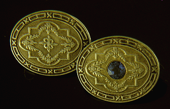 Strobell & Crane sapphire and gold cufflinks. (J8741)