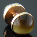 Sansbury & Nellis Tiger Eye cufflinks crafted in 14kt gold. (J9207)