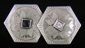 Elegantly engraved sapphire and diamond cufflinks. (J8723)