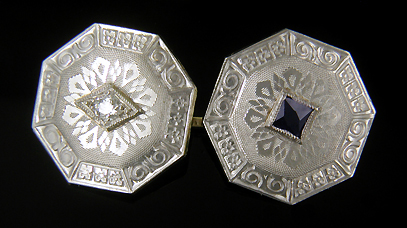 Sapphire and diamond cufflinks. (J9164)
