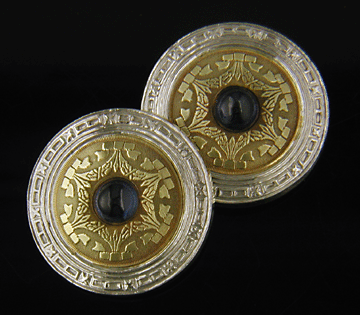 Elegant antique cufflinks with sapphires crafted in yellow and white gold. (J8474)