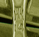 Close-up of TH maker's mark. (J8607)