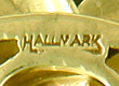 Close-up of United Jewelers' maker's mark. (J6501)