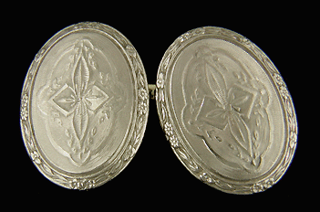 Antique gold cufflinks with a hint of Gothic Revival. (J8795)