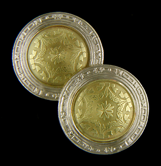 Elegant antique cufflinks crafted in yellow and white gold. (J8985)
