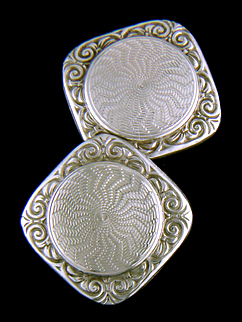 Elegantly engraved antique white gold cufflinks. (J8771)