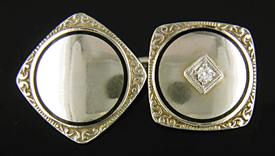 Antique white gold and diamond cufflinks. (J8593)