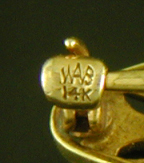 Edwardian gold filigree and tourmaline brooch. (BR9473)