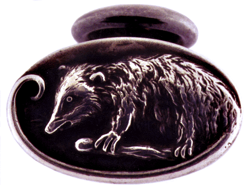Art Nouveau possum cufflink from Unger Brothers. (J3606)
