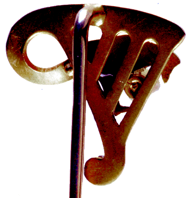 Rear view of Art Nouveau stickpin of serpent with pearl.